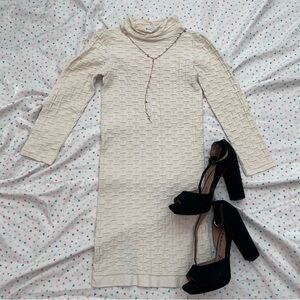 BeBe bodycon mini-dress with high neck and long sleeves